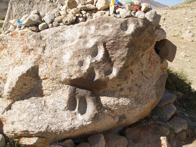 one of footprint stones at the trek